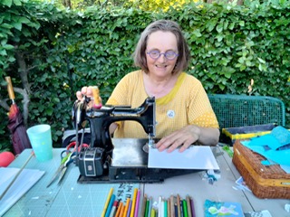 Jyoti at sewing machine