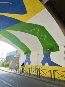 artwork mural on ceiling of road bridge
