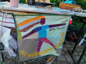 Walking home project banner in garden